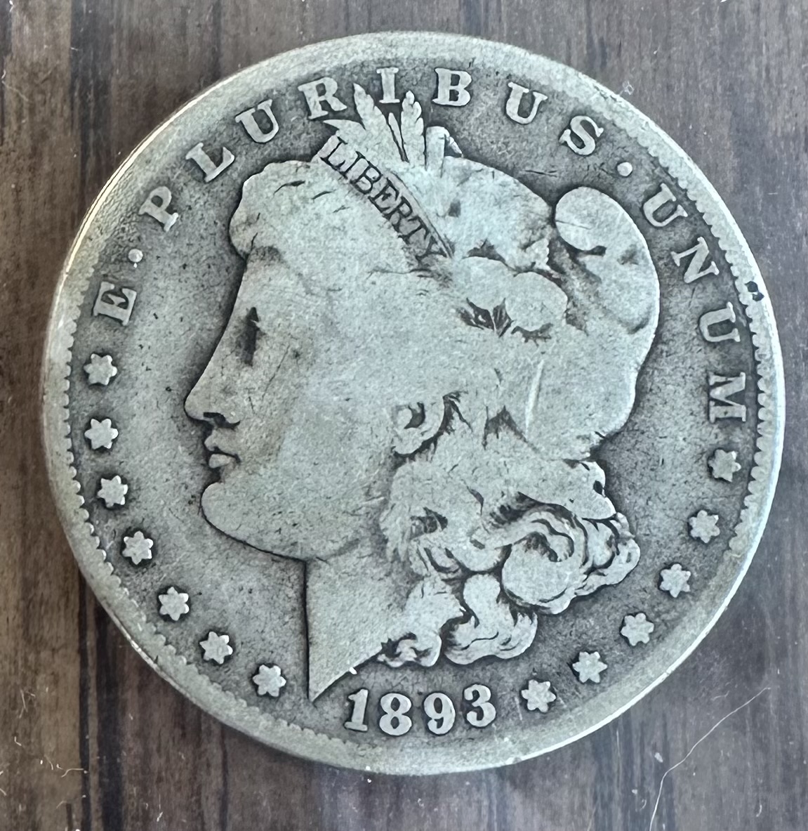 Genuine Morgan Dollar obverse and reverse